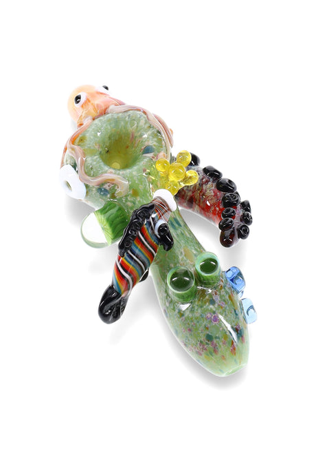 Green frit glass hand pipe with colorful coral, tentacles, and marbles for grip; compact 4″ size in assorted designs.