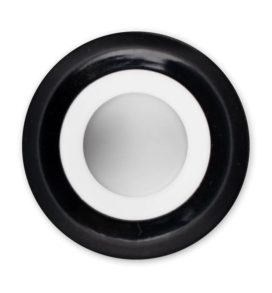 Overhead view of the Proxy 3D Chamber’s white ceramic bowl surface centered inside the round opening.