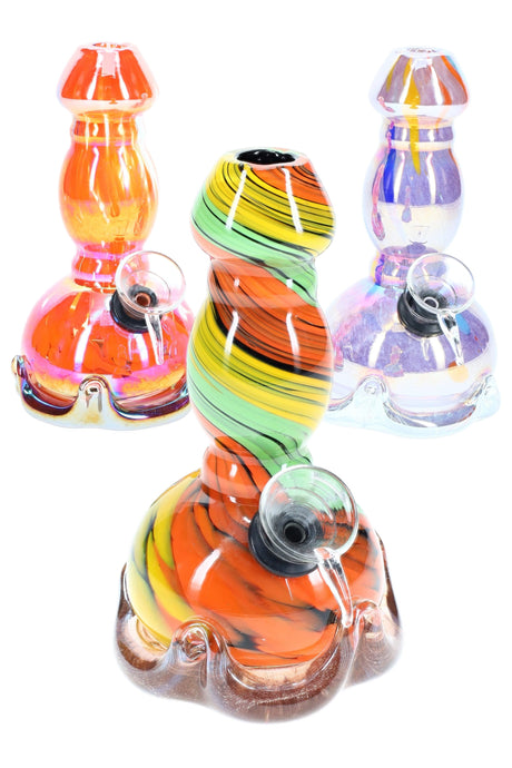 Multicolor 5.5-inch mini beaker bong with swirling rainbow neck and iridescent bubble base, grommet bowl attached, displayed with two assorted color variants on white background.