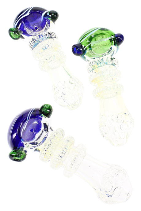 Five-inch color-changing glass spoon pipe with striped dome bowl, stacked ring grips, and textured end cap, shown in assorted colors.