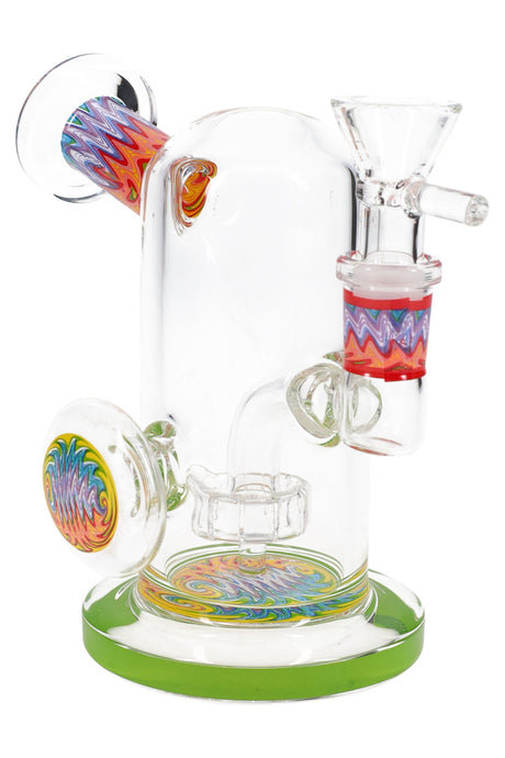 Clear 5″ mini bong with green base, colorful reverse mouthpiece section, and stemline showerhead perc.