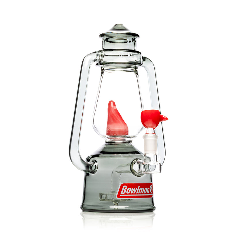 Side profile of Hemper Bowlman Lantern XL lantern-shaped glass water pipe showing Bowlman logo base and clear inner chamber.