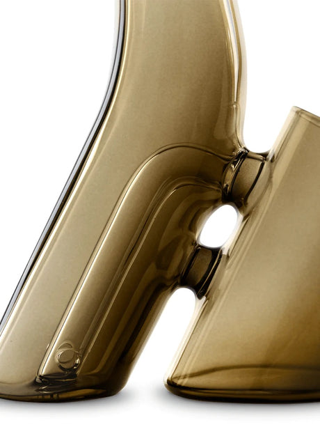 Detail crop of Desert Bub joint and internal pathway, translucent amber glass with percolated water chamber connection.