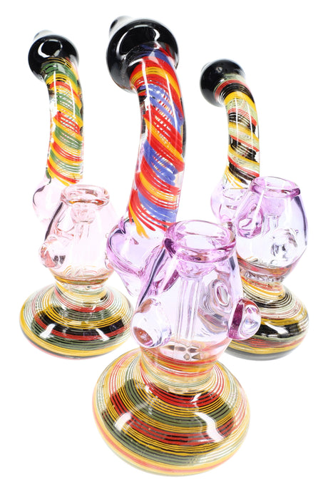 8-inch spiral-striped glass Sherlock bubbler with black accents and water chamber on flared base; multicolor design varies, sold individually.
