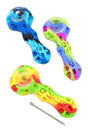 Multicolor Eyce silicone spoon pipe with inlaid glass bowl, embossed grip, and included metal poker; compact 4″ size, ships assorted.