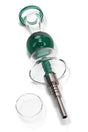 Dark green bubble-center dab straw close-up featuring the glass shield and metal tip next to a quartz dish.