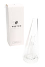 Clear Puffco Peak Glass 2.0 replacement top shown beside retail box, tapered cone body with internal downstem for water filtration.