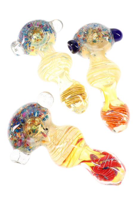 Five-inch color-changing confetti frit glass spoon pipe with striped mouthpiece and raised marble roll-stop, shown in assorted colors.