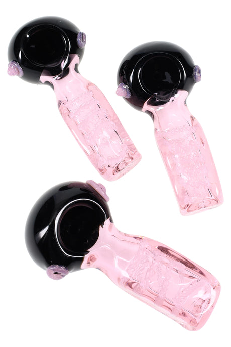 4″ square-handled glass spoon with striped pink body, glossy black bowl, and small marble grips; ships in assorted colors.
