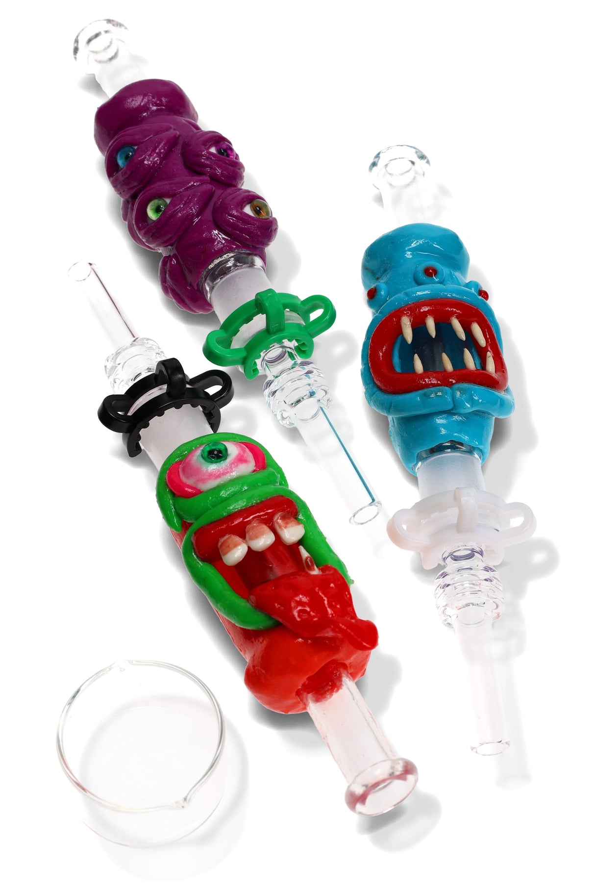 Three monster-themed glass dab straw kits with keck clips and glass dishes, assorted colors and faces, sold individually for concentrates.