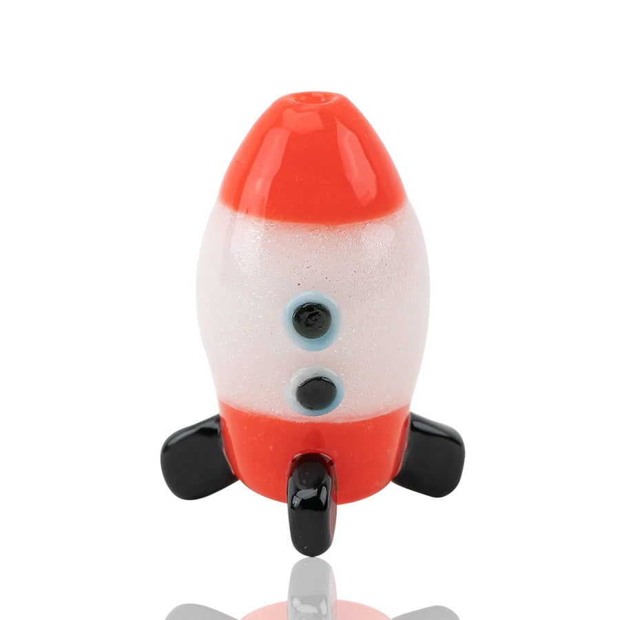 Front view of red and white rocket-shaped glass bubble carb cap with black fins, US-made design for flat-top quartz bangers.