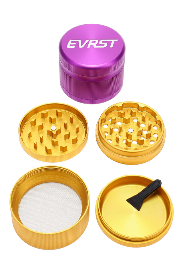 EVRST 63 mm four-part aluminum herb grinder in assorted anodized colors with sifting screen, pollen catcher, and included scraper tool, compact 2.5″ size.