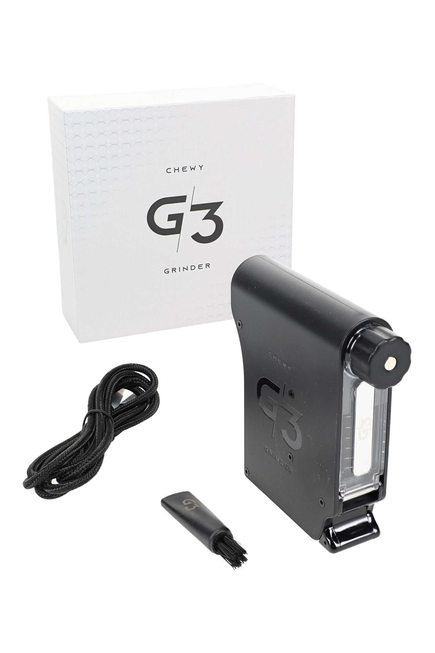 Chewy G3 electric herb grinder kit in black with USB-C cable and cleaning brush; portable trigger-load design with rechargeable battery.