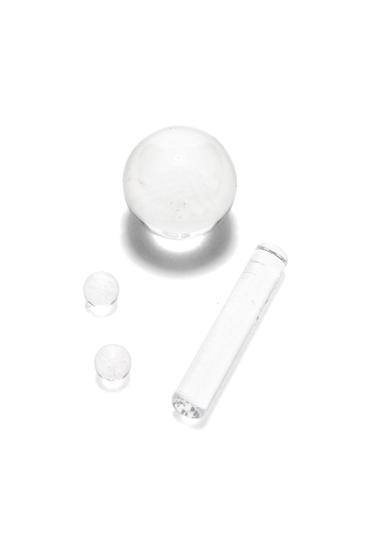 Clear GRAV terp accessory set with one large marble, two terp pearls, and a pillar insert for bucket bangers on a white background.