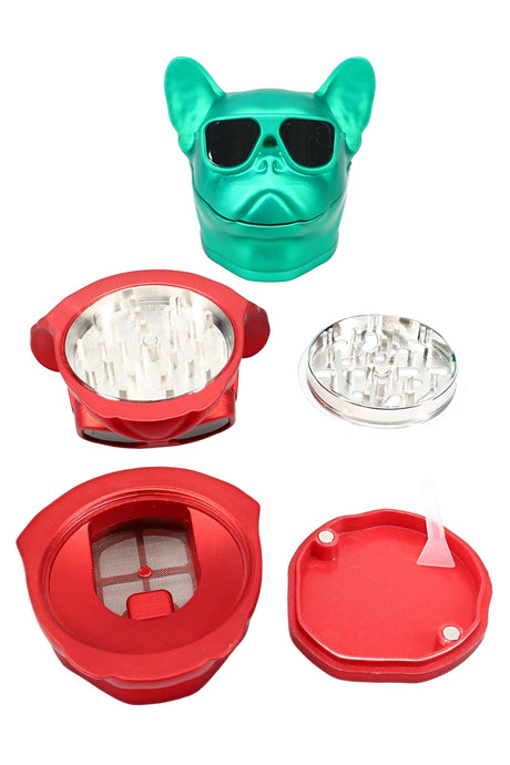 56 mm French bulldog metal herb grinder with sunglasses design, 4-part build, mesh kief screen, scraper, and slide-out dispenser drawer shown disassembled.