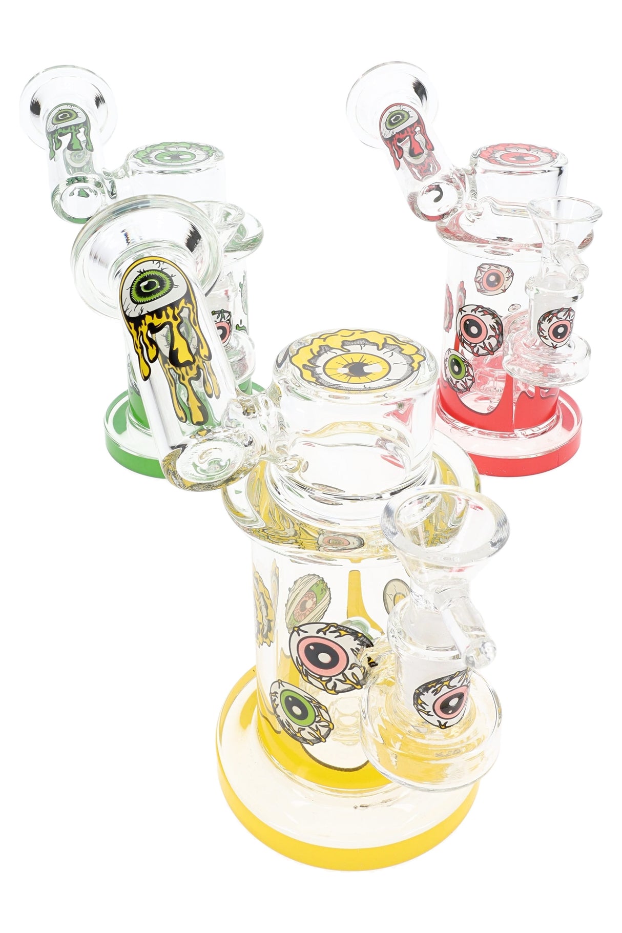 Group of 5.5″ sidecar glass bongs with dripping eyeball decals, showerhead perc, and color bases in green, yellow, and red.
