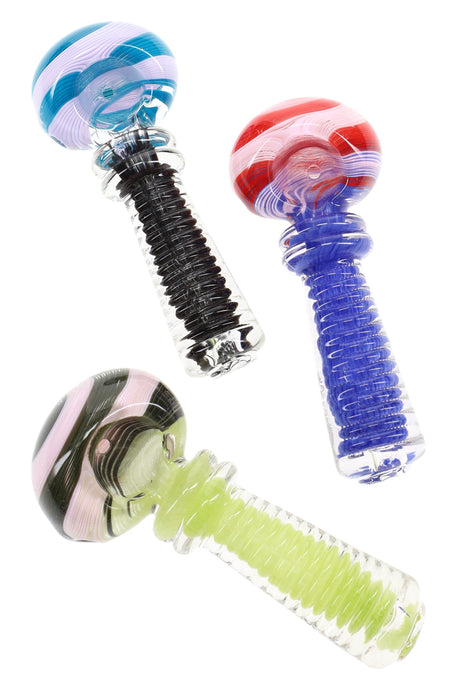 Compact 4″ swirl-striped glass spoon pipe with ribbed frit handle and deep bowl, shown in assorted colors.