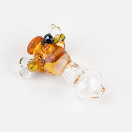 Empire Glassworks beehive Peak Pro cap showing amber hive, two mini bees, and a clear glass ball cap section, on white.