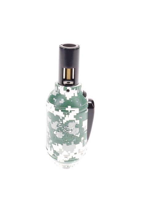 Close-up of Special Blue Grenade Pixels torch lighter in green digital camo showing compact body, ergonomic handle, and single-jet nozzle on white.