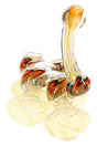 Angled close-up of color-changing fumed glass chambers with bold red, yellow and green stripes on large sherlock glass bubbler, highlighting airflow path.