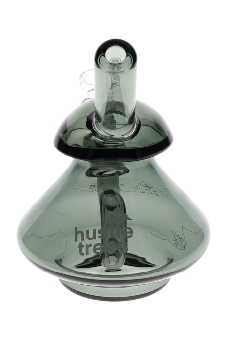 Front view of smoke glass wobble bubbler showing self-righting base, etched Hustle Trees graphics, and GRAV logo.