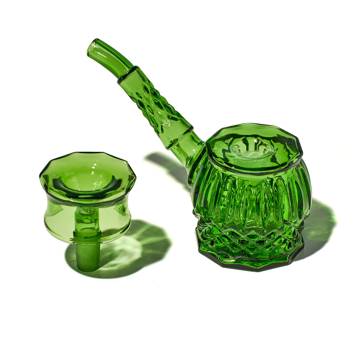 Emerald NWTN Home Highball glass bubbler with removable 14 mm slide separated from the textured base