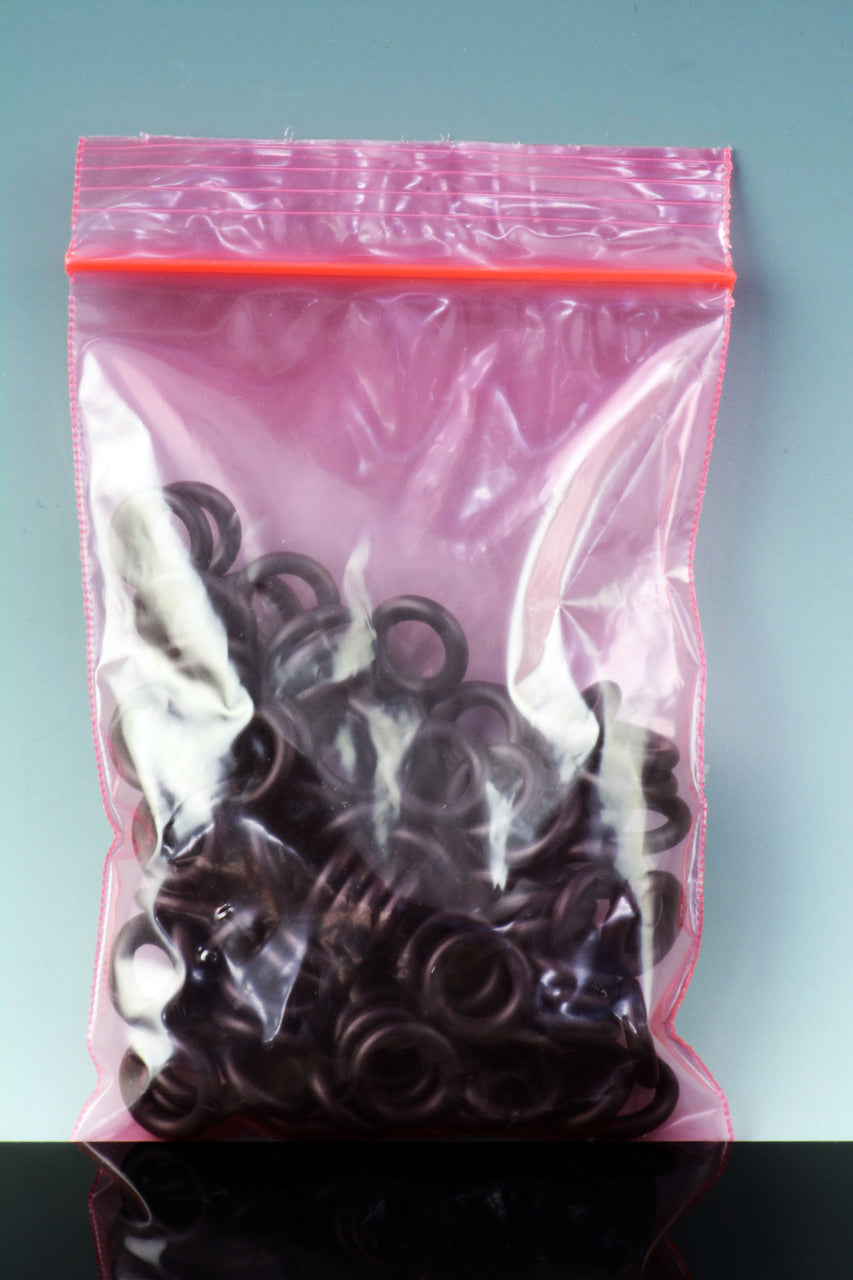 Bulk pack of black 9 mm O-rings in a pink zip bag, viewed upright to show quantity.
