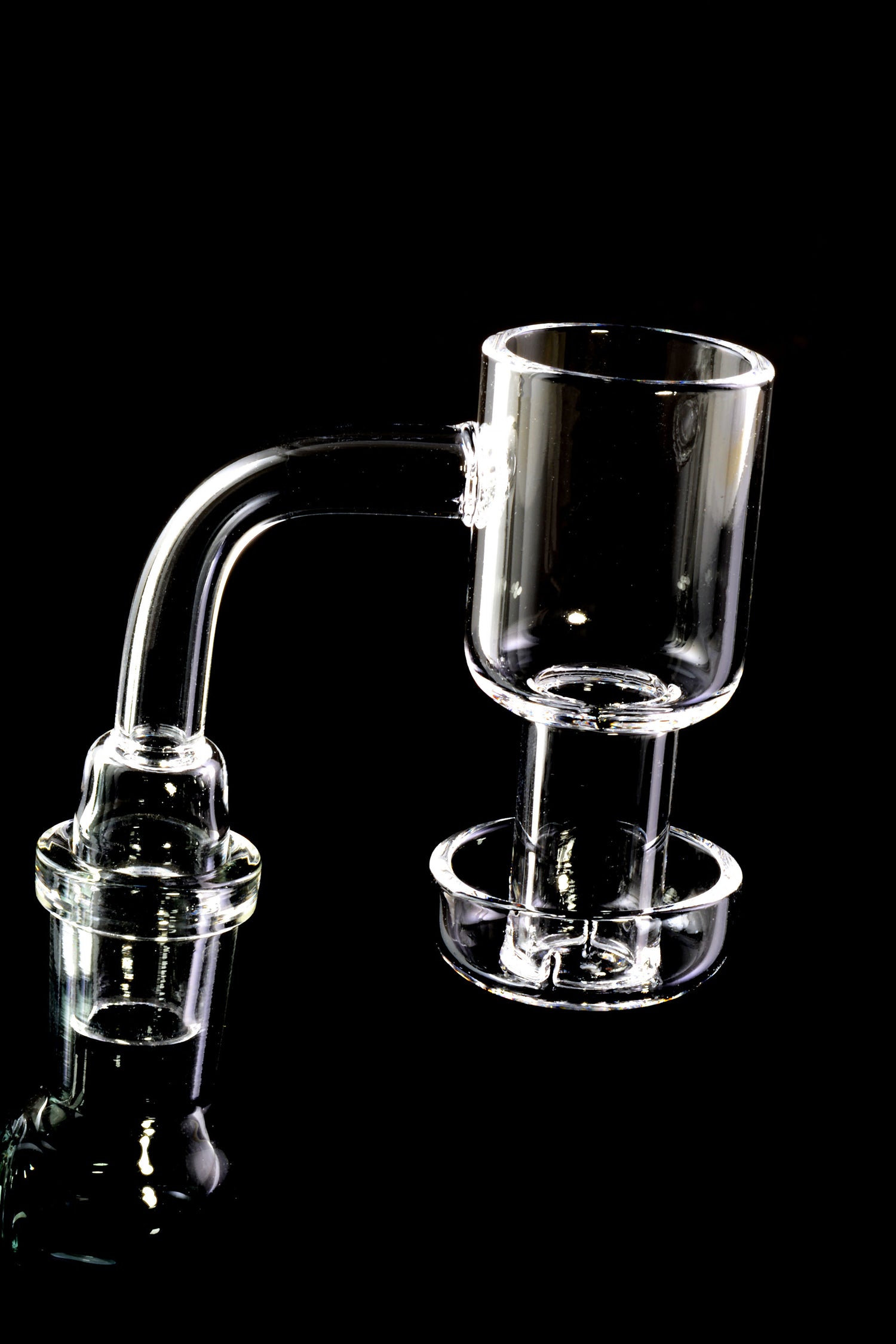 Quartz terp slurper banger mounted on a rig, 90-degree neck with 14.5 mm male joint and lower dish ready for use with marbles.