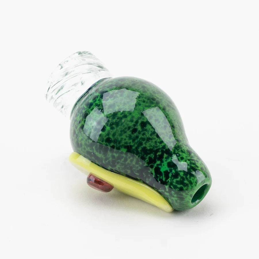 Rear angle of avocado-themed bubble spinner cap highlighting speckled green “skin” and airflow opening on top.