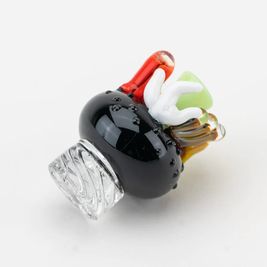 Side view of coral reef carb cap highlighting raised black texture and spiral base for directional airflow.