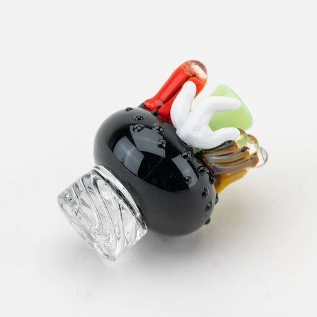 Side view of coral reef carb cap highlighting raised black texture and spiral base for directional airflow.