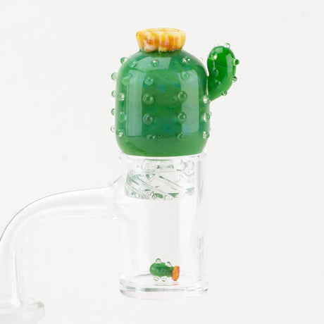 Cactus spinner cap on a flat-top quartz banger with the mini bead in the bucket, illustrating setup on a dab rig.
