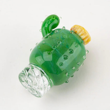Cactus spinner cap on its side, showing curved arm, raised glass spines, and a twisted clear base for airflow control.