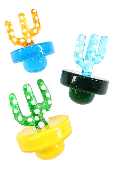 Cactus-shaped glass carb cap with bubble base and directional airflow in blue, teal, and yellow; playful dab rig accessory.