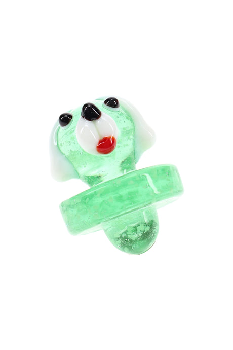 Green transparent glass dog carb cap with white ears and red tongue, wide bubble base for smooth vapor control.