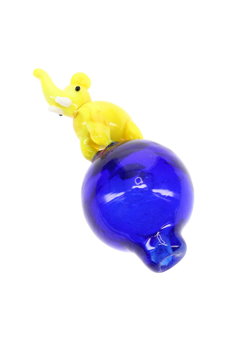 Yellow elephant carb cap with cobalt blue bubble base, orb shape supports directional airflow and heat retention.