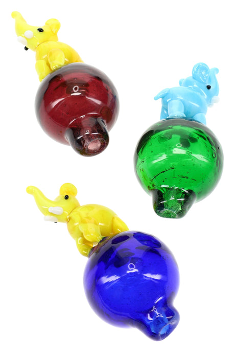 Trio of elephant bubble carb caps in blue, yellow, and mixed colors with round bases for directional airflow on flat-top bangers.