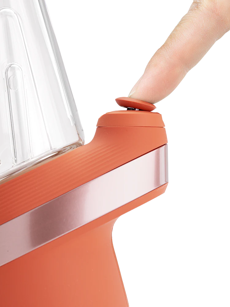 Closeup of the New Peak Canyon joystick carb cap being pressed, demonstrating directional airflow control.