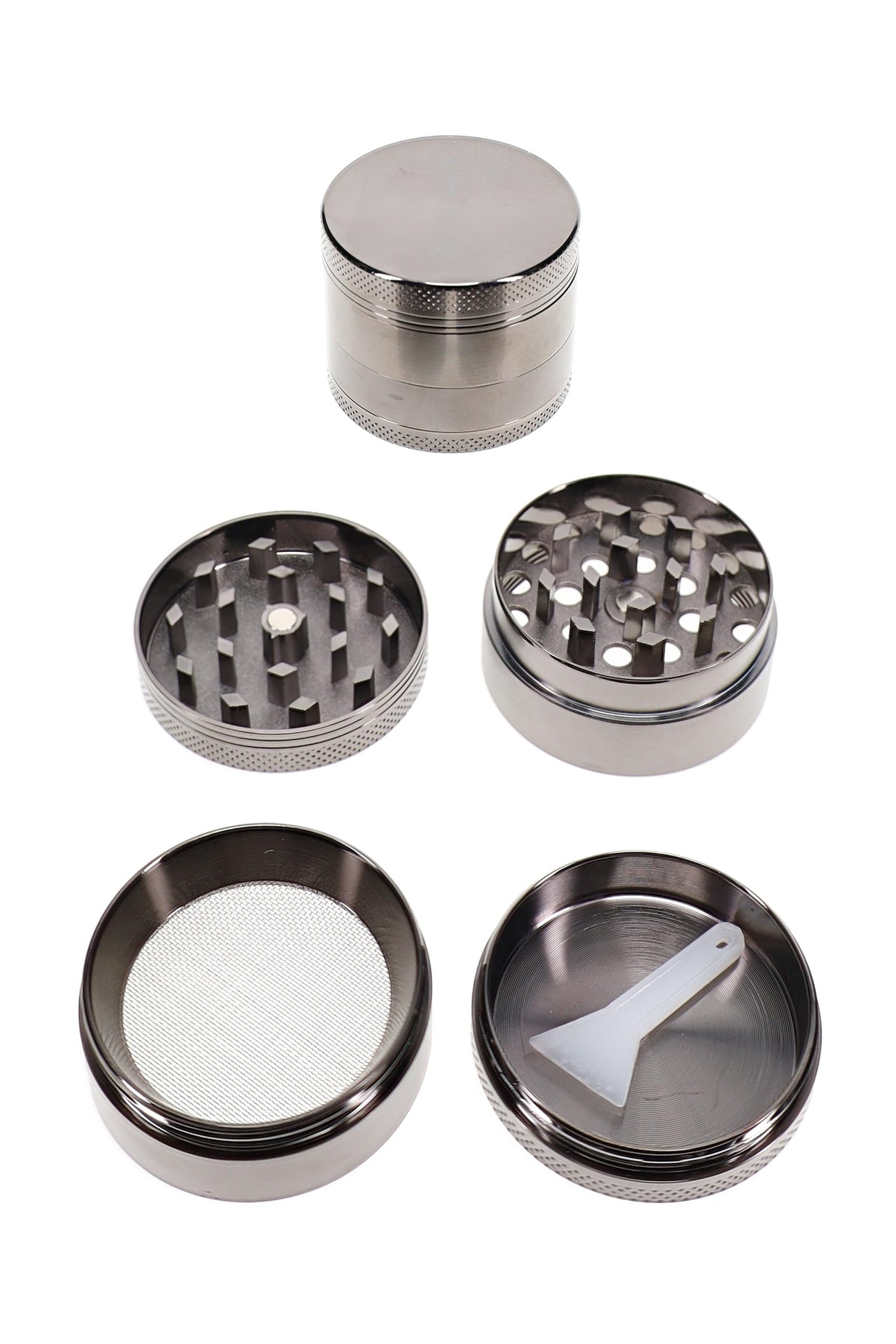 Open 4-part metal herb grinder with screen chamber, scraper, and compact 1.5 inch silver body