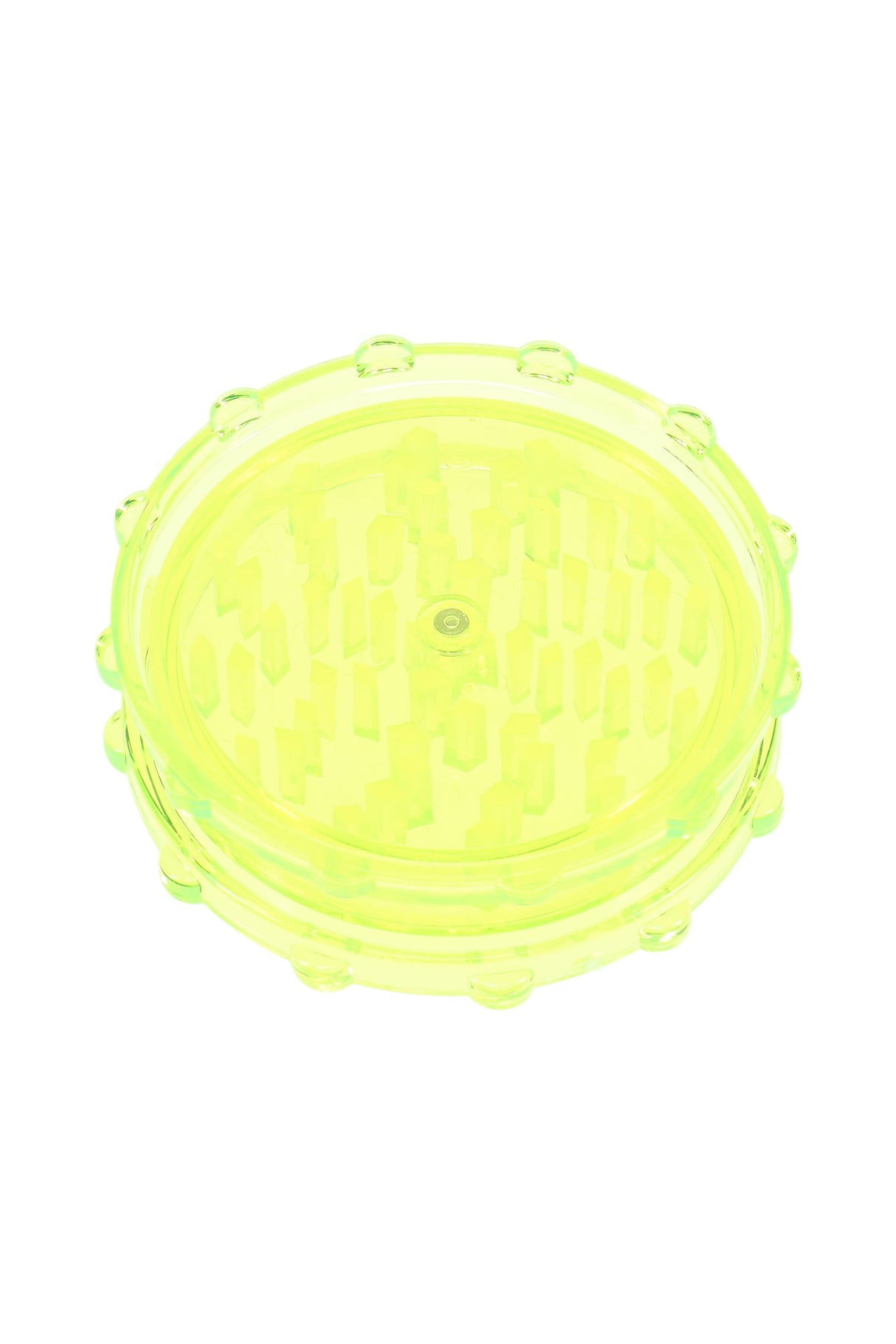 Neon yellow acrylic magnetic 2-piece grinder showing clear chamber and uniform peg teeth.