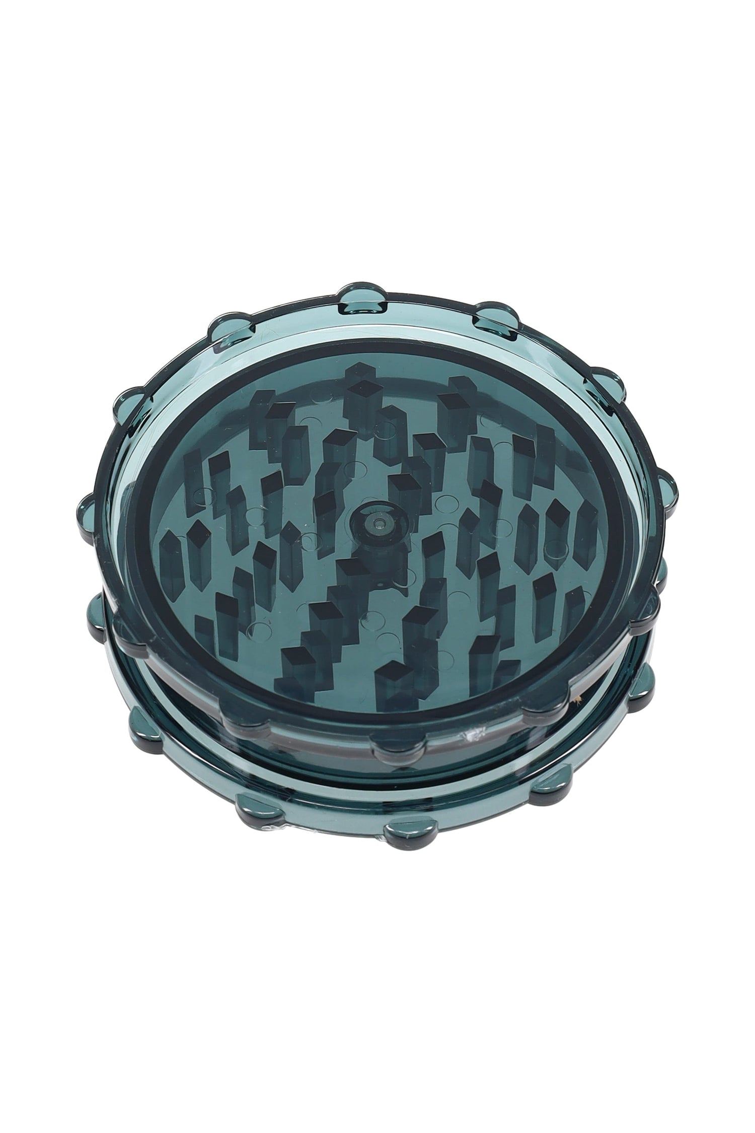 Smoke gray acrylic 2-piece magnetic grinder with visible teeth and rounded grip nubs.