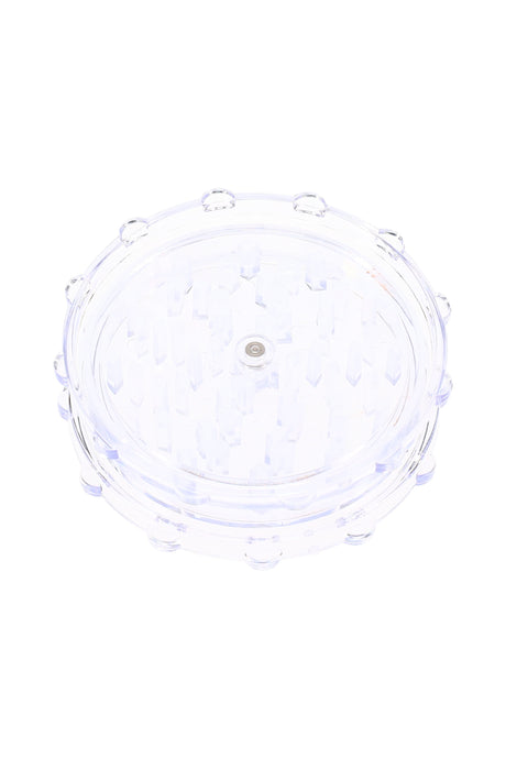 Clear acrylic magnetic herb grinder, compact two-piece style with aligned center magnet.
