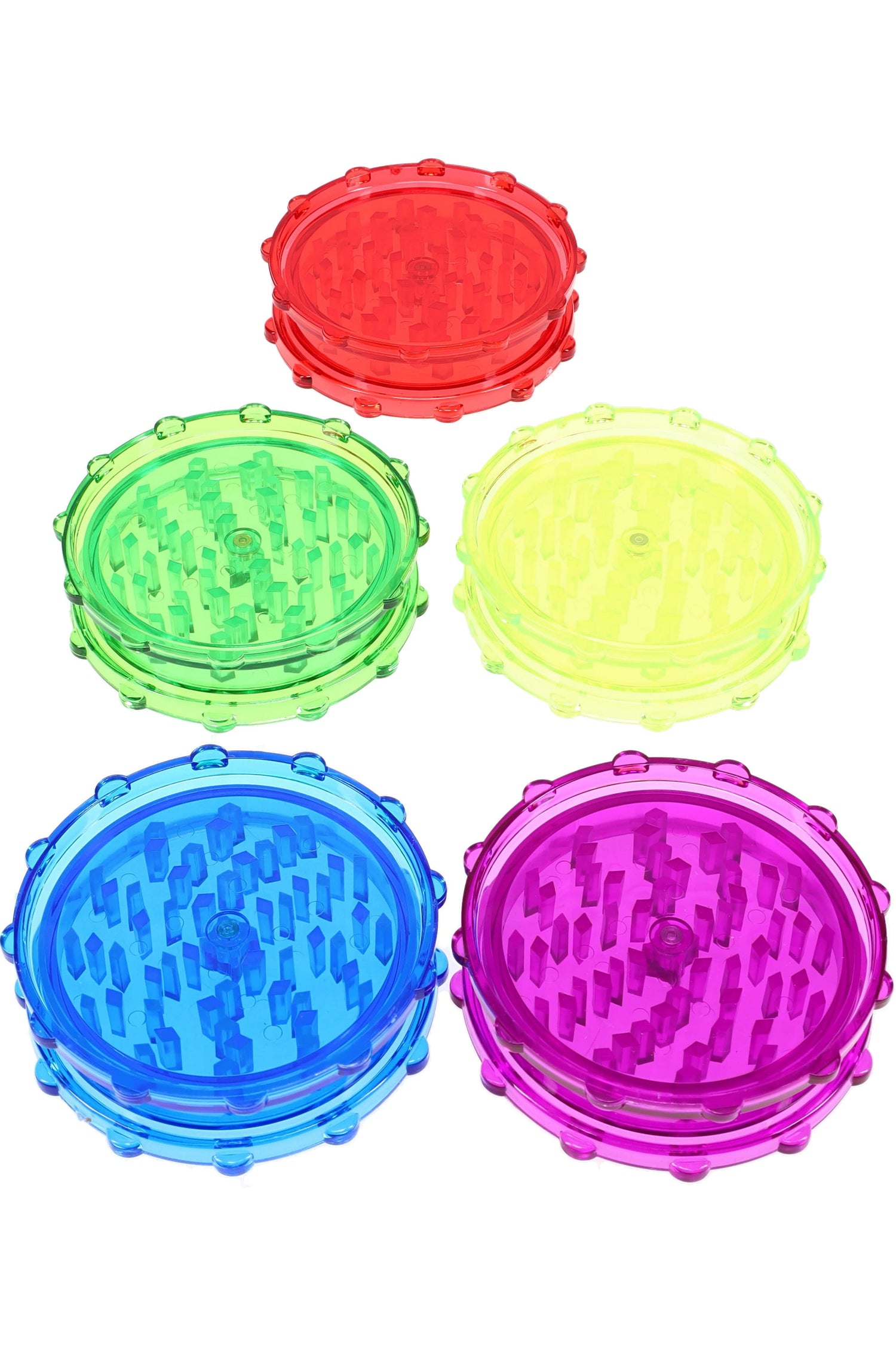 Set of five acrylic magnetic 2-piece herb grinders in bright translucent colors, compact and travel friendly.