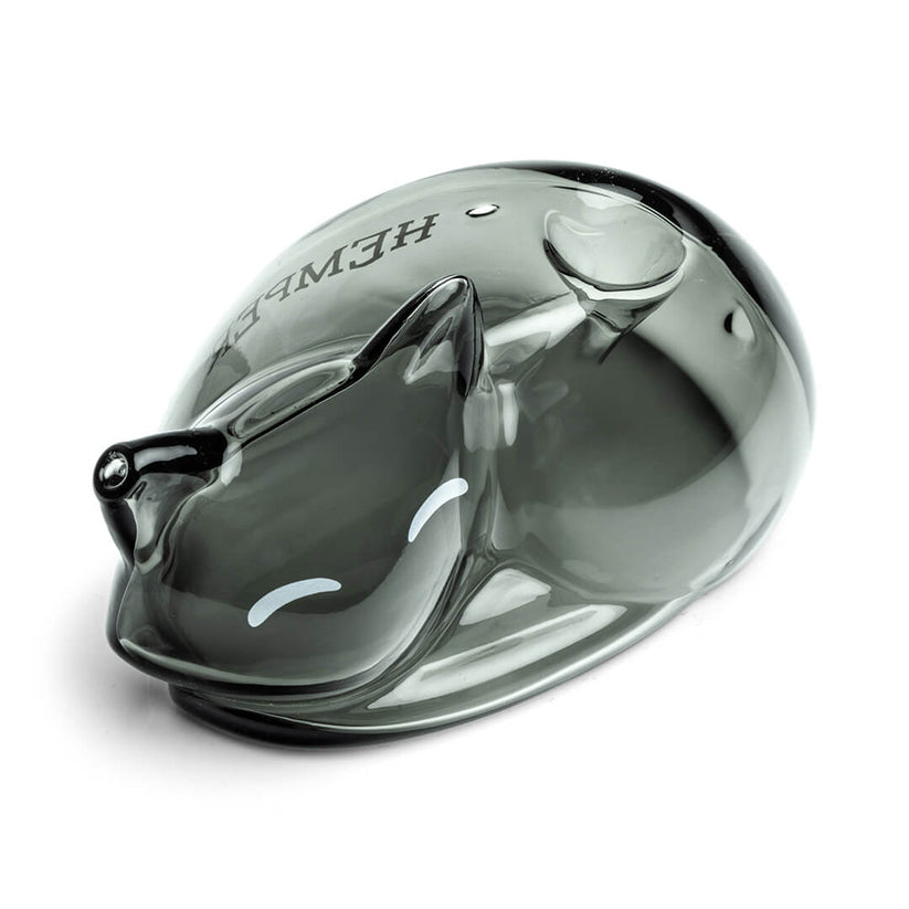 Angled top view of Hemper Alley Cats smoky gray cat hand pipe showing bowl, carb hole and curled body on a clean white surface.