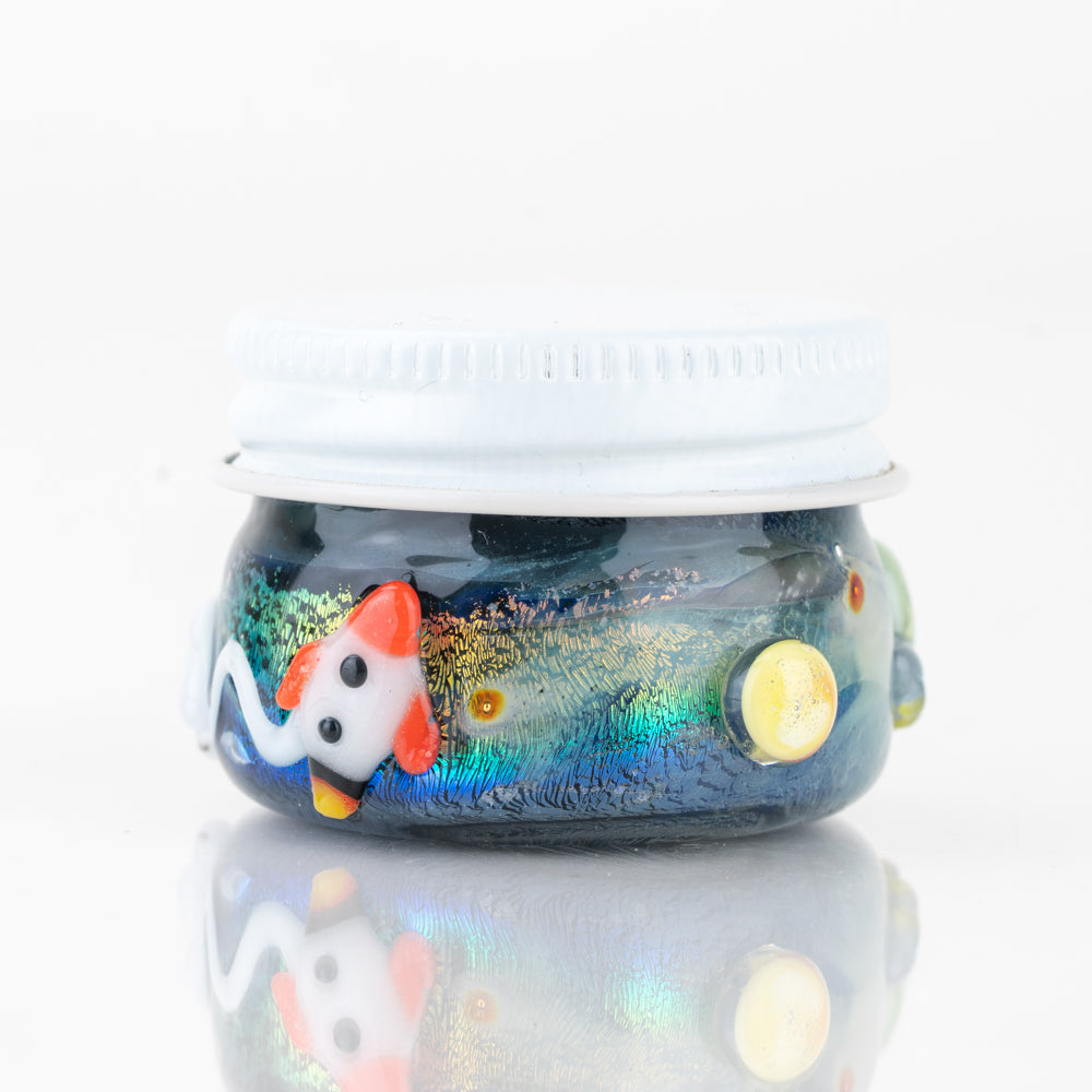 Empire Glassworks Across the Universe terp jar with astronaut, stars, and galaxy glass accents