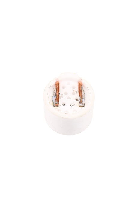 Backside of Solopipe Elektra ceramic bowl showing perforated base and two copper contact tabs on a compact white insert.