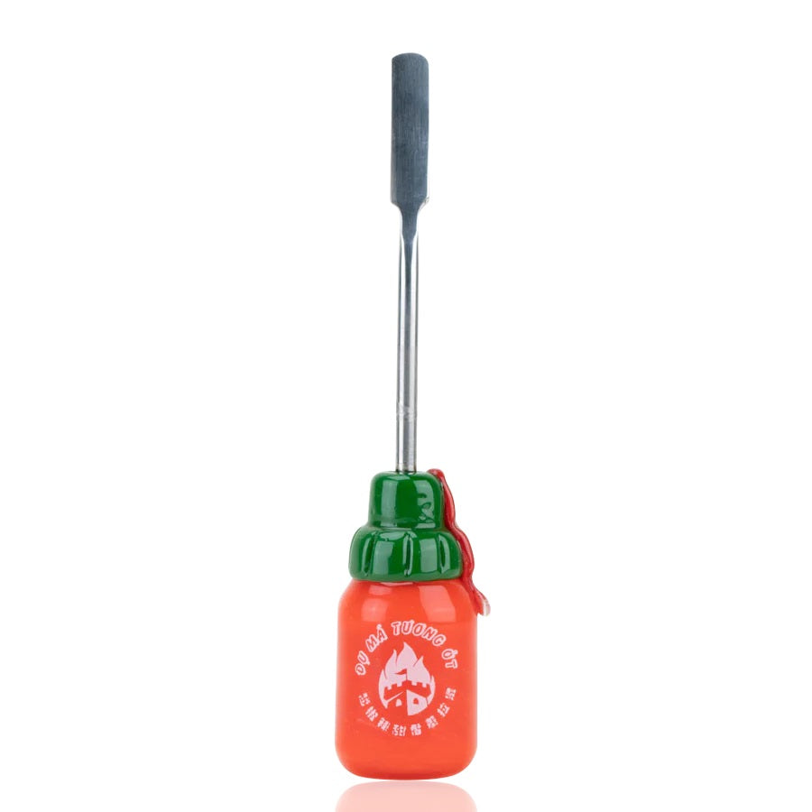Front view of 5-inch Sriracha bottle glass dabber on white backdrop highlighting flat stainless scoop and detailed chili graphic on neck.