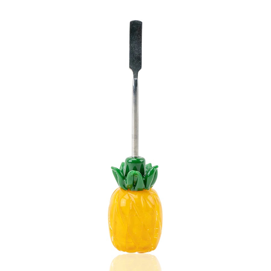 Front view of 5-inch pineapple glass dabber on white backdrop highlighting stainless flat scoop and sculpted green leaves.