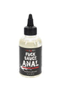 4 oz Fuck Sauce Anal numbing lubricant in clear squeeze bottle with precision nozzle and black label, close-up retail product photo.