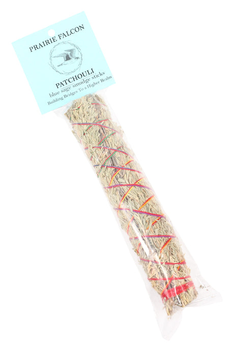 Prairie Falcon blue sage smudge stick labeled “Patchouli,” sealed sleeve with header card and colored wrap.